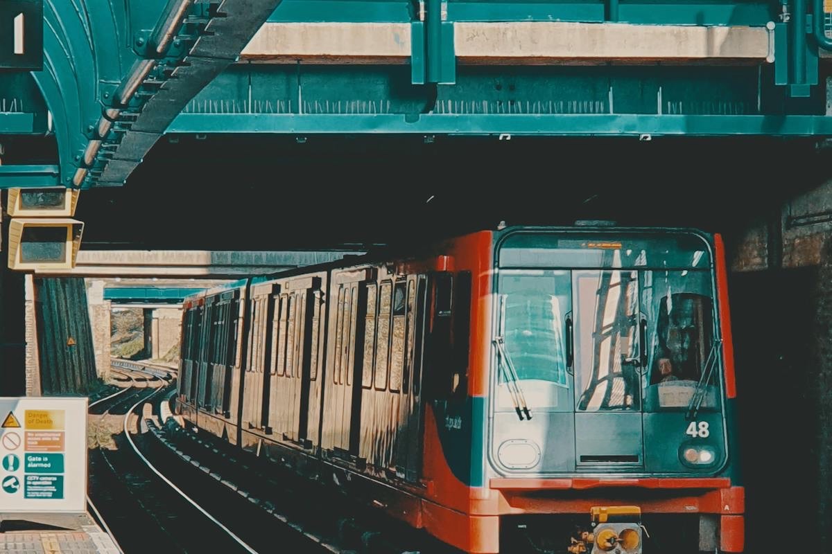 A Docklands Light Railway train at a station, showing its cab-less front