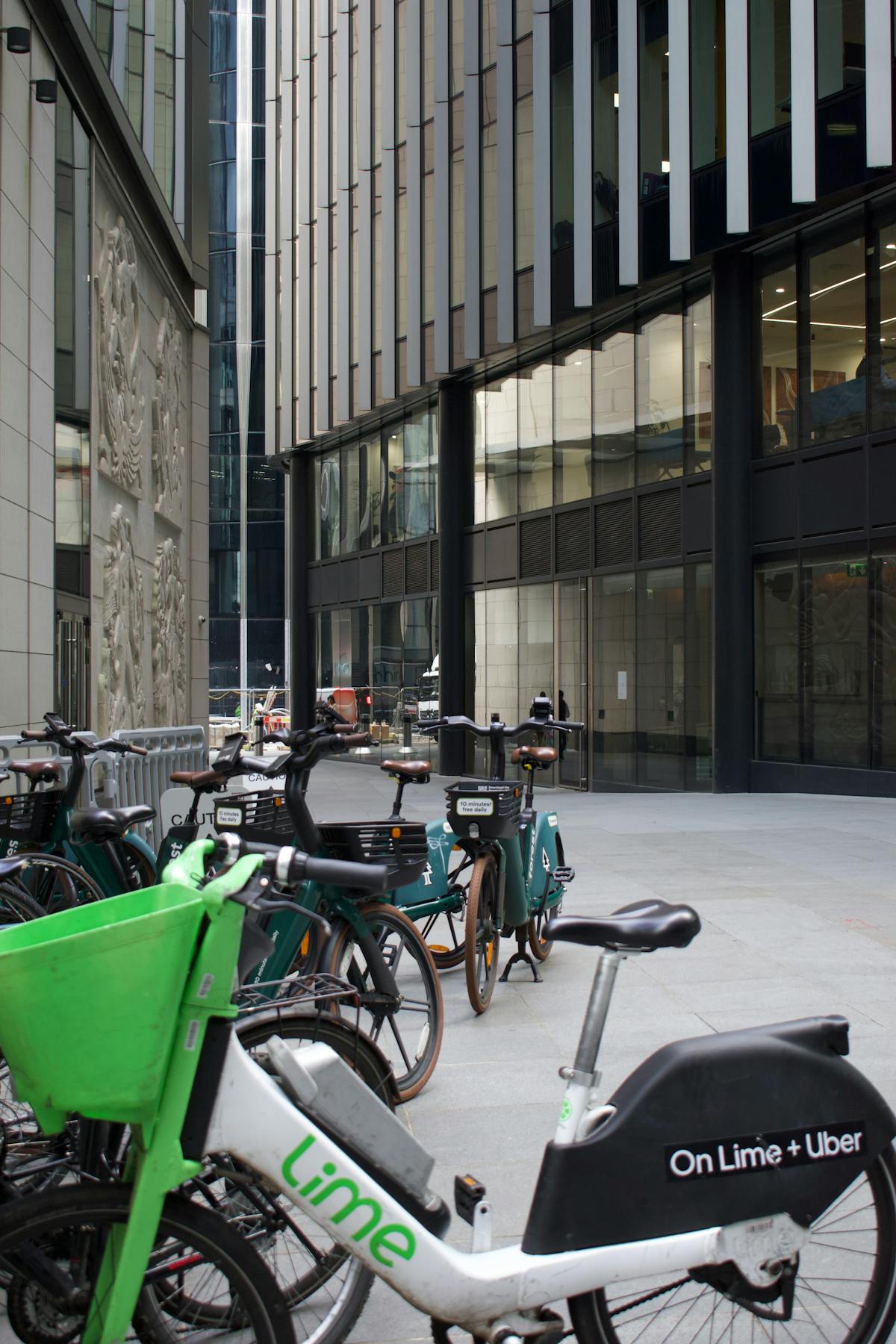 Rental bicycles lined up in a London alley